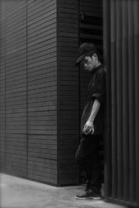 man, smoking, worker, break, street photography, black and white, gray smoke, gray photography